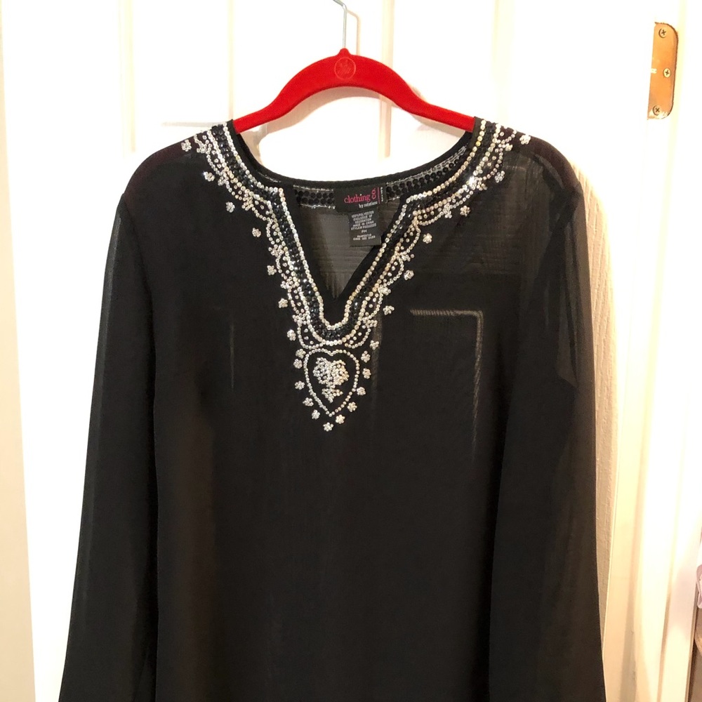 Pretty sheer evening blouse with sparkle
